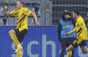 Lässt sich im Regen von Dortmund feiern: BVB-Torjäger Erling Haaland (links).