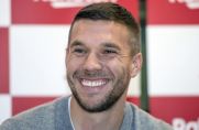 Lukas Podolski lächelt.