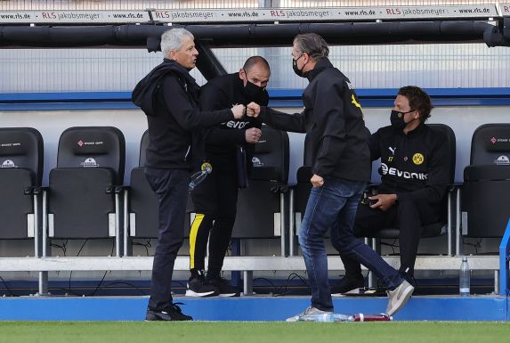 Trainer Lucien Favre (links) und Manager Michael Zorc verlangen volle Konzentration für den Bundesliga-Endspurt.