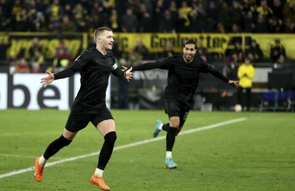 Dortmunds letzte Partie an Karneval war erfolgreich. Hier bejubelt Marco Reus, gemeinsam mit Emre Can, seinen 3:1-Treffer gegen die Hertha.